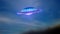 UFO. Unidentified Flying Object on sky background.