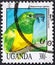 UGANDA - CIRCA 1992: post stamp 300 Ugandan shillings printed by Republic of Uganda, shows African Emerald Cuckoo