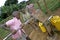 Ugandan Children fetch water at water pump