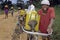 Ugandans lugging with drinking water and bananas