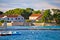 Ugljan island village old church and beach view