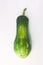 Ugly food concept. Unusual shaped zucchini with mold, scar-like structure, scratches. Top view