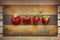 Ugly food. Strange deformed strawberries on wooden background. Misshapen produce, food waste problem concept.