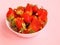 Ugly food: unusual strawberries in a plate