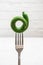 Ugly misshapen cucumber on white background