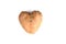 Ugly potato in the heart shape isolated. Food waste concept