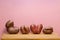 Ugly potatoes on cutting board. Funny composition in the form of the word Love. Concept - Vegetable letters. Horizontal