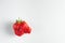 Ugly strawberry isolated at white background. Strange strawberry looks like elephant head