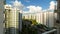 UHD 4k movie of moving clouds and blue sky over apartment buildings in Punggol in Singapore