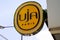 uja paris logo and text sign of un jour ailleurs trademark clothing fashion store