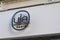 Uja paris text and logo sign front of un jour ailleurs store clothing women fashion