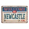 UK cities retro newcastle welcome to Vintage sign. Travel destinations theme on old rusty background.