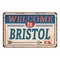 UK cities retro welcome to Bristol Vintage sign. Travel destinations theme on old rusty background.