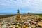 Uk coloured towers by the sea laid by people