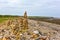 Uk coloured towers by the sea laid by people