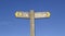 UK and Europe - Conceptual Signpost with a blue sky background