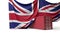 UK flag draped over a commercial trade shipping container. 3D Rendering