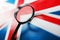 UK flag looking through a magnifying glass. The study of the history and culture of the people of the great country of England.