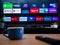 UK, Jan 2020: smart TV showing featured apps on android television screen