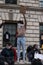 UK, London, 6/6/2020 - A mixed race Black Lives Matter protester waving an anti-racism placard