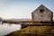 UK, Norfolk, Thornham, Old Harbour, 2109, April, 22: Coal Barn at Thornham in early morning light