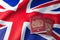 UK passport on the flag of the United Kingdom. Getting a UK passport, naturalization and immigration concept