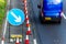 UK Road Services Roadworks Cones and directional Signs on motorway with blue van passing