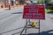 A UK road sign warning drivers that the road surface has been stripped back ready for resurfacing