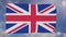 UK United Kingdom British flag waving at wind