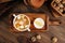 Ukha fish soup with lemon on the wooden table