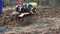 UKRAINE, BOLGRAD - OCTOBER 19, 2021: a farmer on a gasoline mini tractor digs the ground in the field