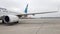 Ukraine, Borispol - March 27, 2020: engine turbine and wing of a large passenger plane awaiting departure at the airport against