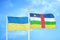 Ukraine and Central African Republic two flags on flagpoles and blue sky