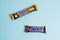 Ukraine, Chernihiv, April 26, 2023: Flatlay, delicious chocolate bars in packages on a blue background