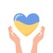 Ukraine conflict - hands with heart colored as ukrainian flag, support Ukraine. Vector illustration in flat cartoon