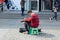 Ukraine Dnepr 10.07.2021 - A street musician plays a guitar on the street in the city center in summer