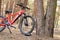 Ukraine Dnipro 05.04.2021 - a red electric bike is recharged in a forest in a park, new technologies