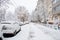 Ukraine Dnipro 26.12.2021 City in winter with cars in the snow and people trying to get to the robot in the morning after snowfall