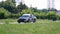 Ukraine, Dnipro - July 10, 2018: Black racing Mitsubishi riding a race road among the grass