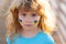 Ukraine flag on kids cheek. Protect save ukrainian children. No war, stop war, russian aggression. Little ukrainian