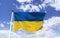 Ukraine Flag Mockup fluttering under blue sky