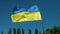 Ukraine flag waving in the wind with a blue sky background. Footage 1080p. Video. Full hd