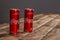 Ukraine. Kiev - 11,25,2019 Coca-Cola can on a wooden table. Tasty, sweet drink with bubbles. Coca Cola drinks are made by The Coca