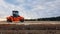 Ukraine, Kiev - October 1, 2019: Road roller, tractor and construction equipment are working on a new road construction site. The