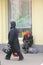 Ukraine, Kiev. The old woman asks alms in the street.