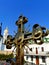 Ukraine. Kiev. Orthodox golden cross with church.