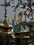 Ukraine. Kiev. Orthodox golden cross with church.