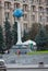 UKRAINE, KIEV - September 11,2013: Leisure travelers near monument reference point distances from the center of Kiev