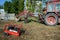 UKRAINE - MAY 06, 2017: The electric welder repairs the excavator by welding. Diesel generator for emergency electric power.