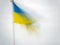 Ukraine national flag blowing in the wind. Impressionist effect with copyspace.